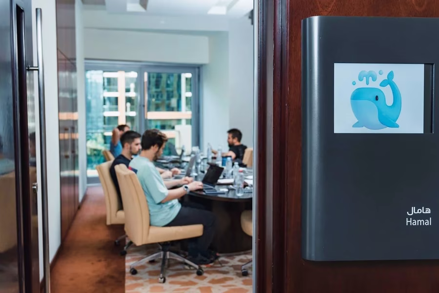 Office workspace with the whale logo